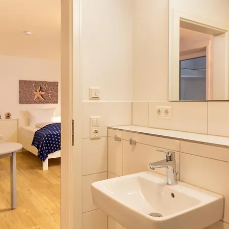 Ferienhaushaelfte Joeri Hues 1 Prázdninový dům